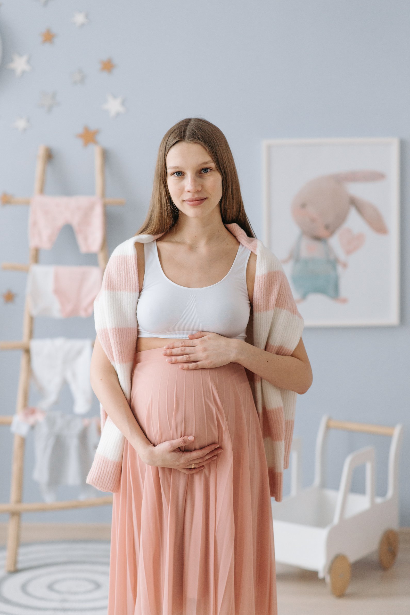 Pregnant Woman Holding Her Baby Bump